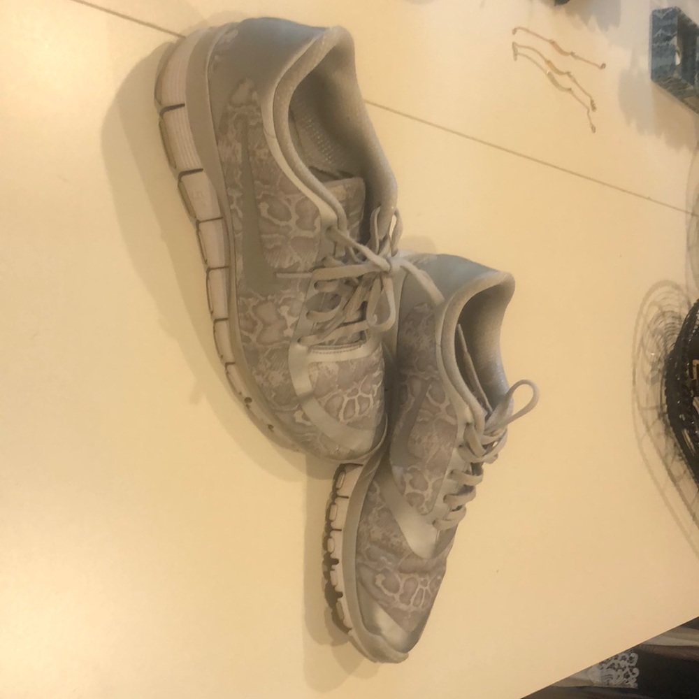 Nike Gray/silver/white animal print.